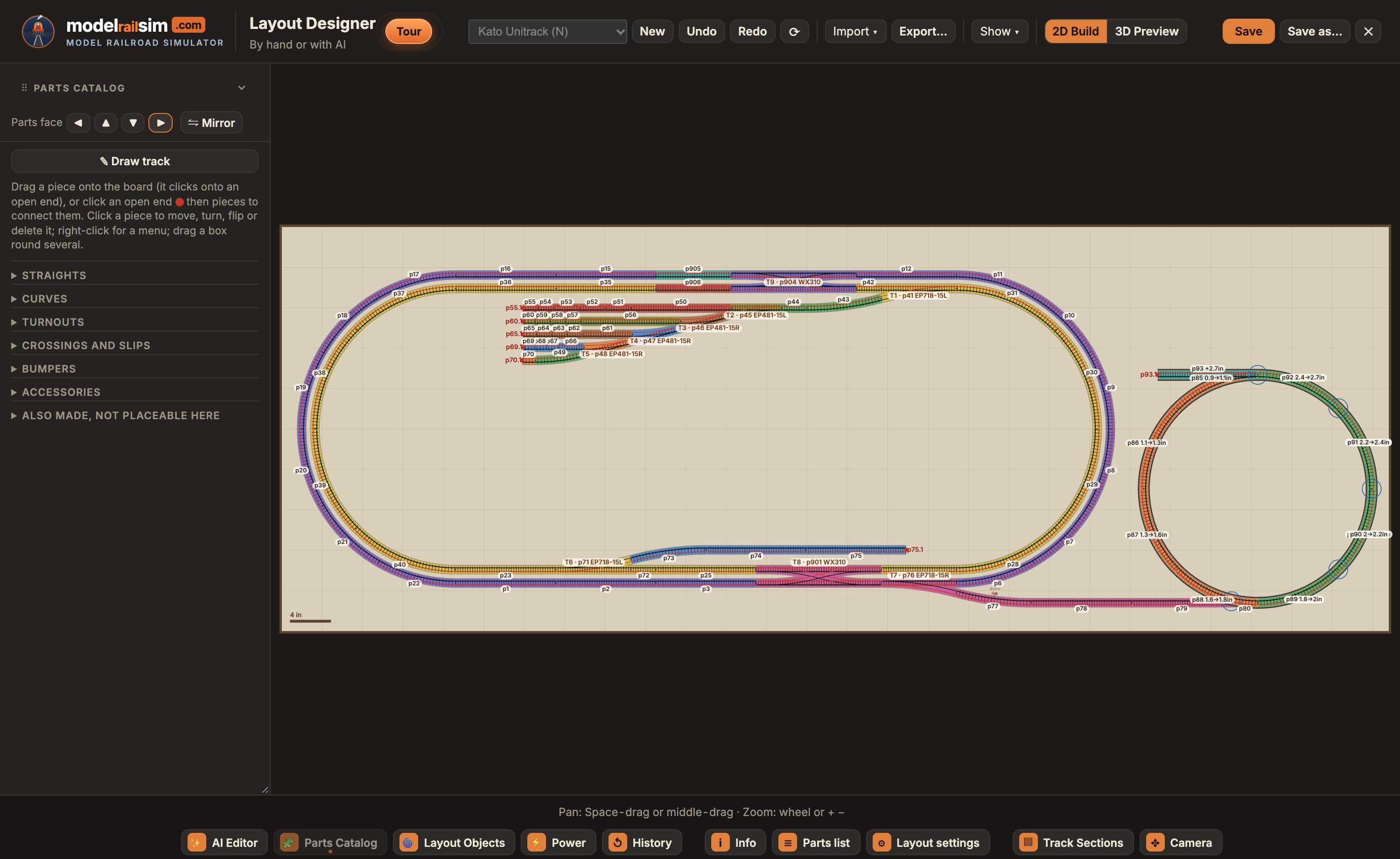 The Layout Designer: a double-track oval in Kato Unitrack with two double crossovers, a five-track yard, a freight-house spur and a helix to an upper level, colored by track; the Track Sections, Power and Camera cards beside it.