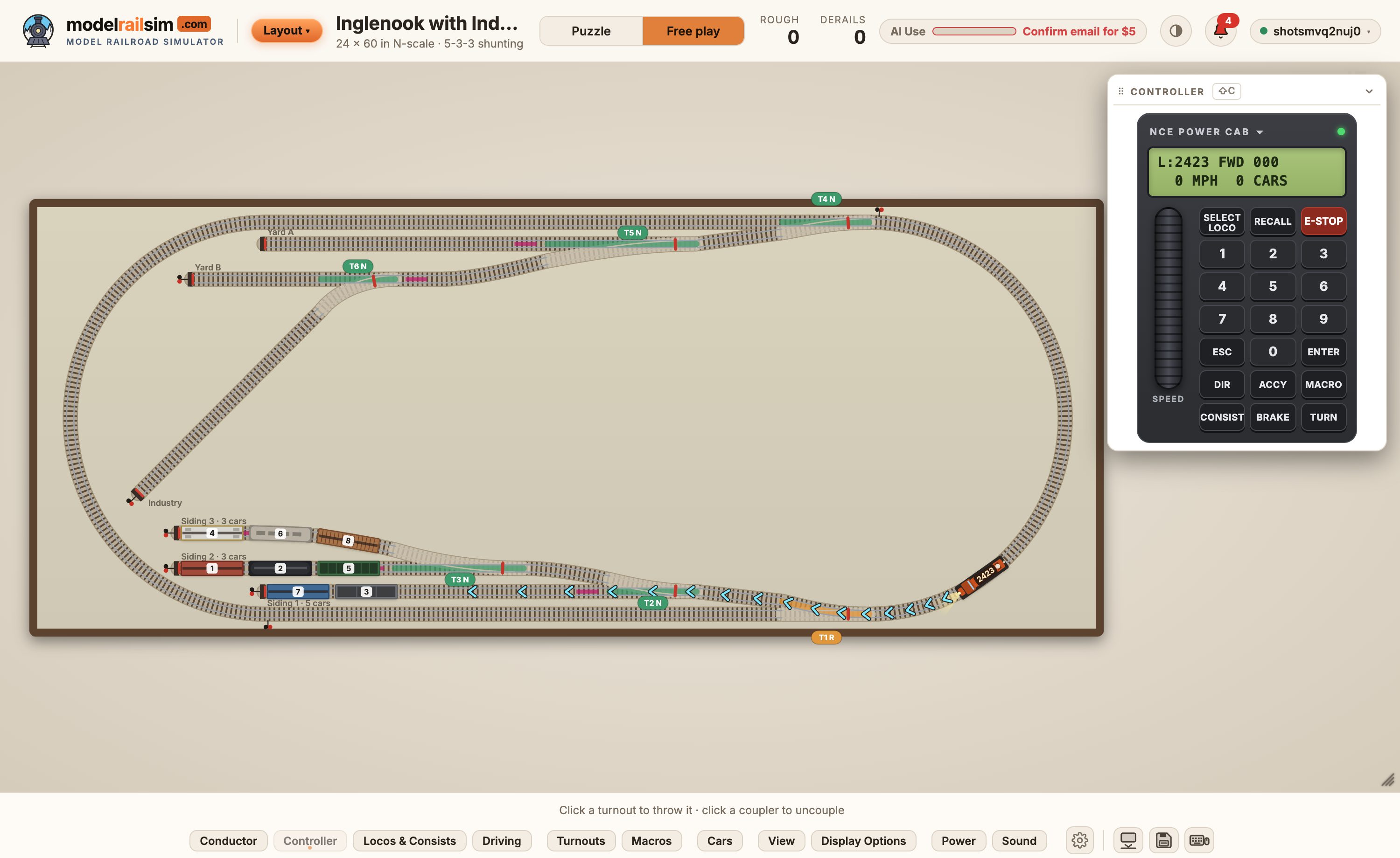 The simulator: an N-scale layout with a train in the sidings and the NCE Power Cab beside it